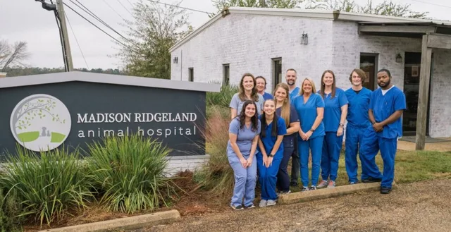 MRAH team standing in front of the clinic